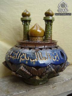 مجسمة اين الطالب بدم المقتول بكربلاء