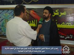 المعرض الاول لمسابقة الفنون التشكيلية / مدير المركز مع قناة الفرات